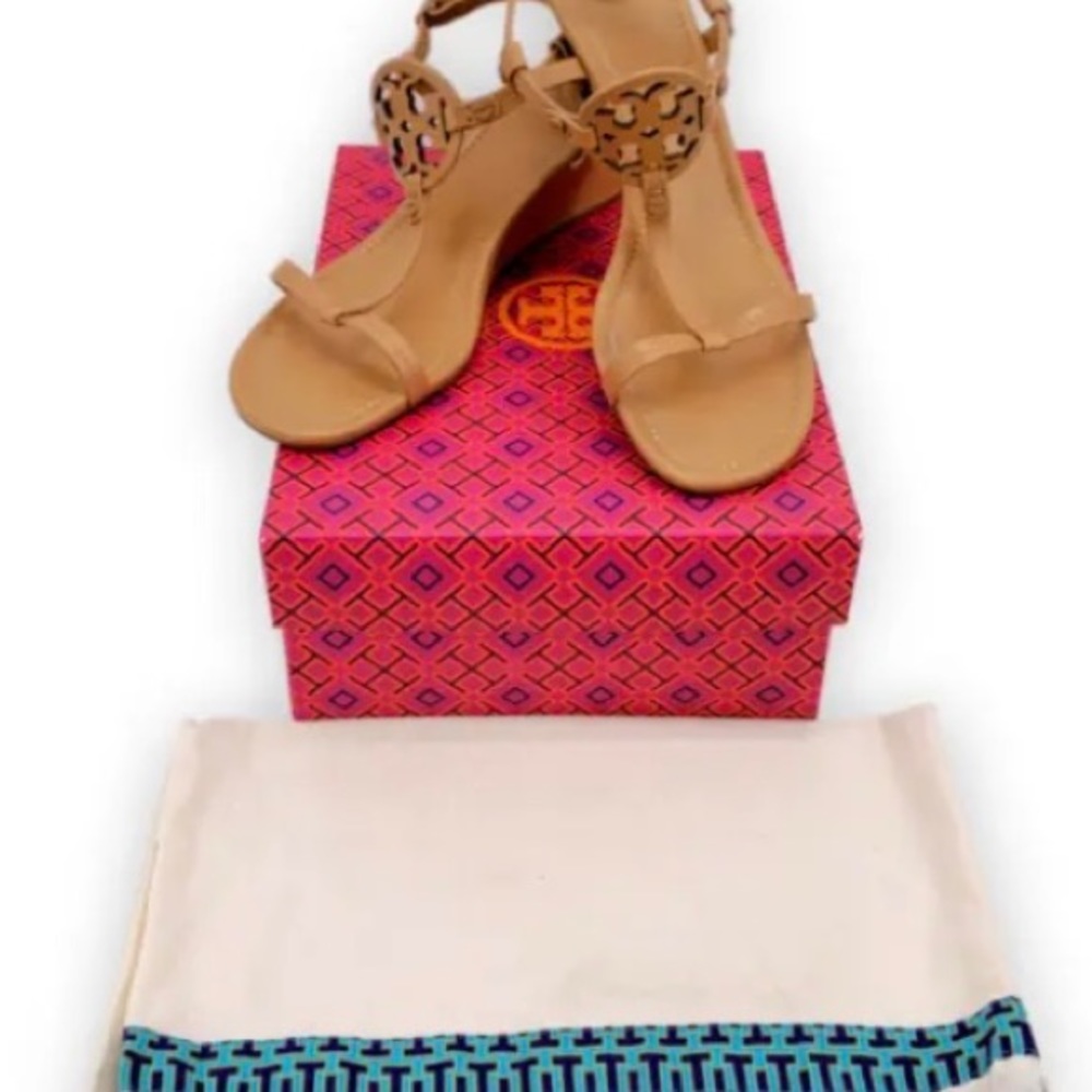 Perfect condition Tory Burch wedges. Size 8.